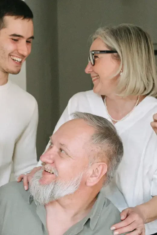 A happy family supporting a loved one in recovery