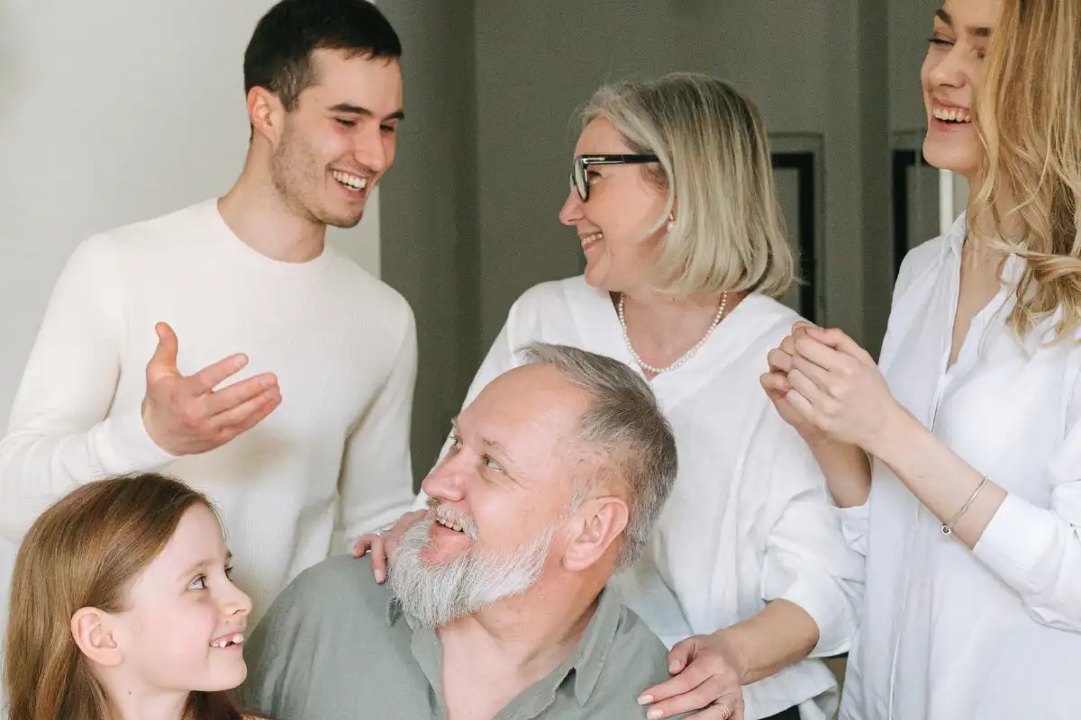 A happy family supporting a loved one in recovery