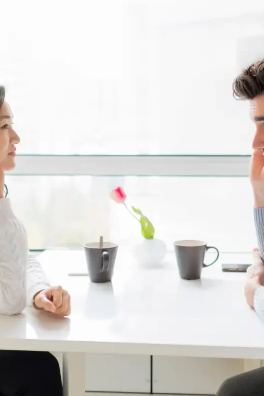 a couple sharing morning with a cup of coffee