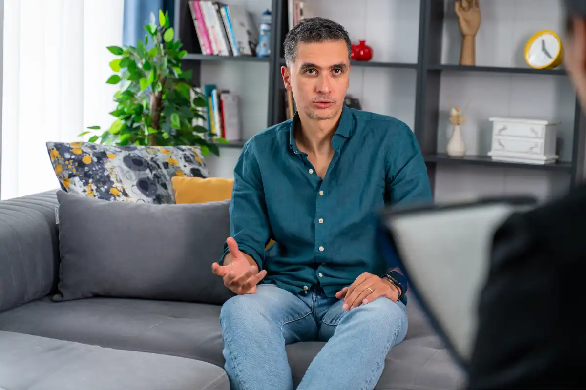 a man having psychotherapy session at psychologist's office