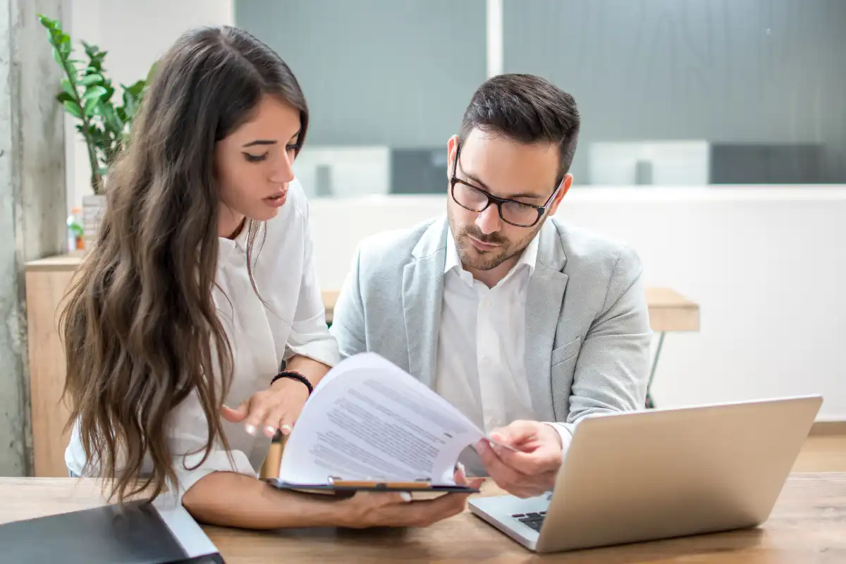 administrative staff discussing Insurance In-Network vs. Out-of-Network Coverage
