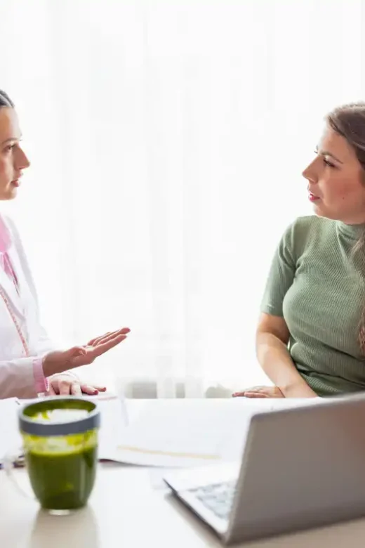 Dietician Discussing Nutrition with female client