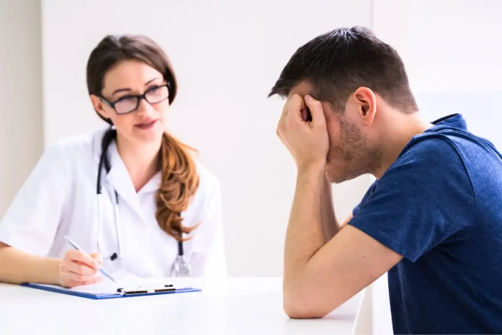 Doctor Consultation Patient At Table