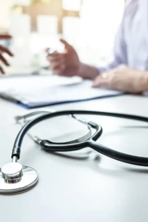 Doctor Consulting with Patient