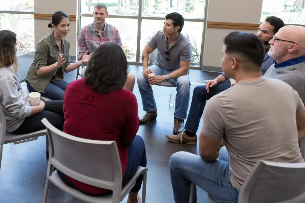 Female therapist facilitates support group