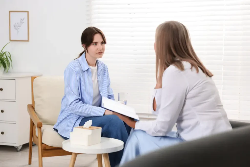 Professional Psychotherapist Working with Patient in Office