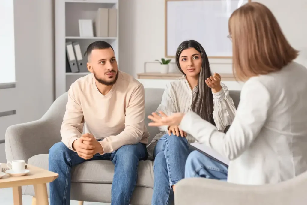 Young couple talking with Psychologist
