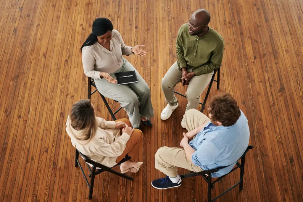 people in a group therapy