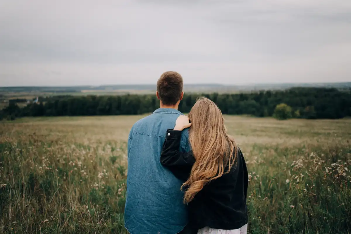 A Back View of a Couple Looking at a Landscape (1)