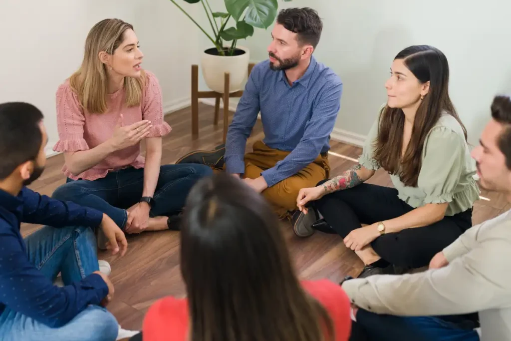 Support group having a conversation about mental health