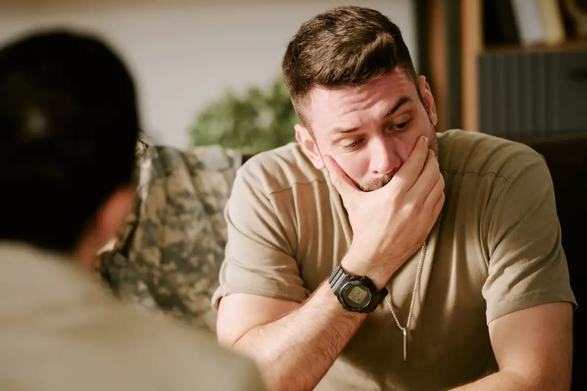 Young Adult Caucasian Man Contemplating during Psychology Counseling Session