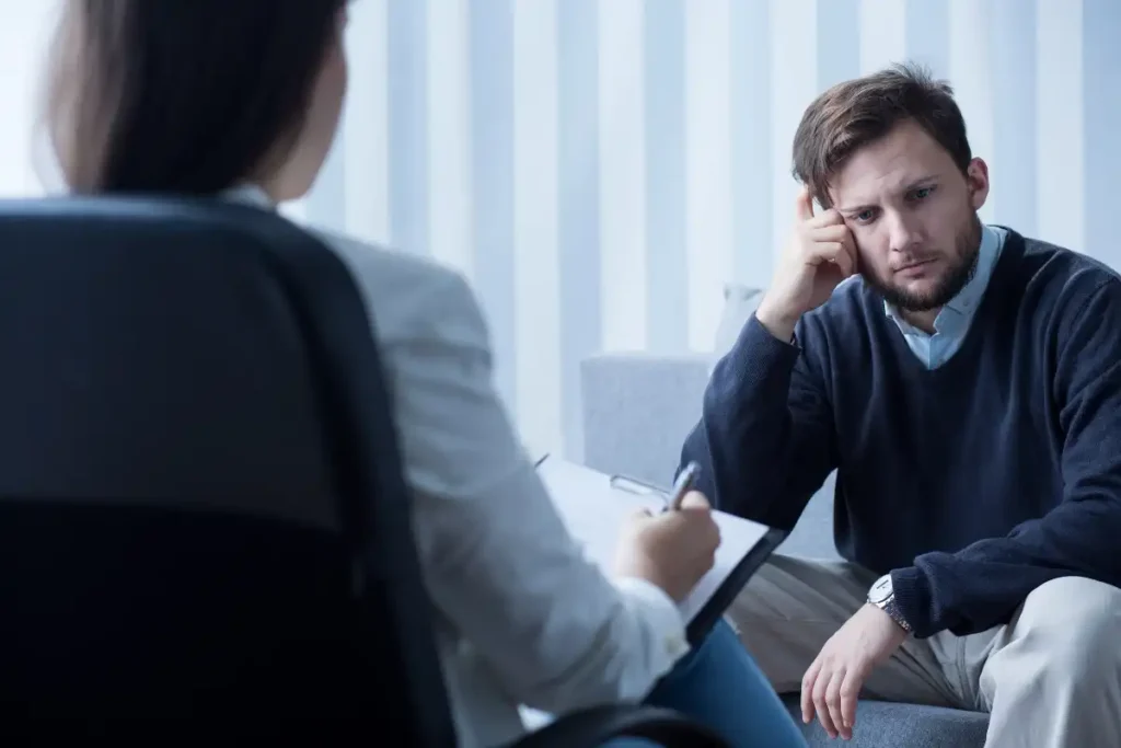 a depressed man during dual diagnosis treatment