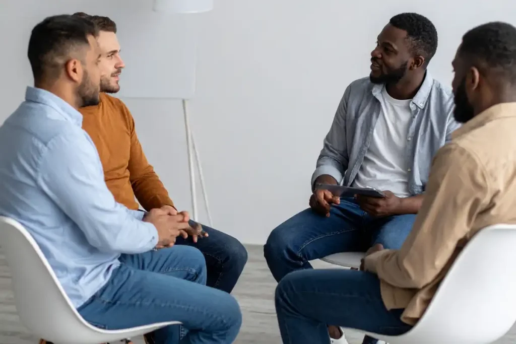 men during 12 step meeting