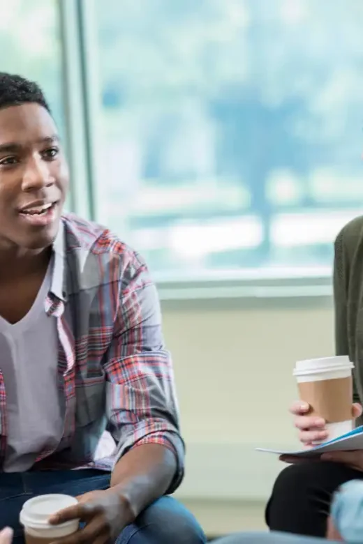 Young adults discuss issues in support group meeting