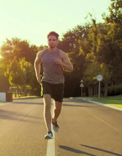 man jogging in the park how exercise supports sobriety