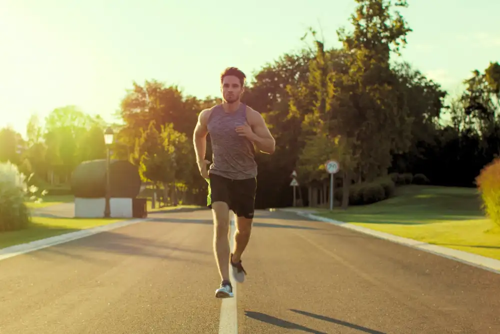 man jogging in the park how exercise supports sobriety