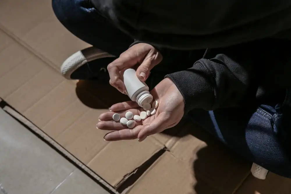 man with anxiety taking drugs