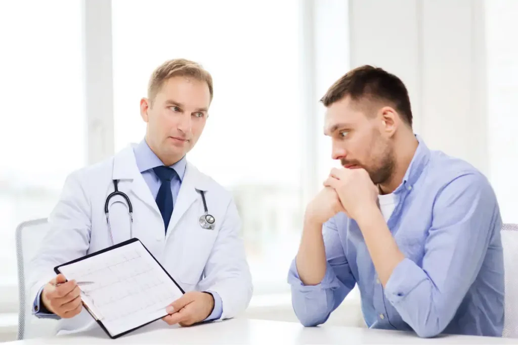 Doctor with Clipboard and Patient in Hospital