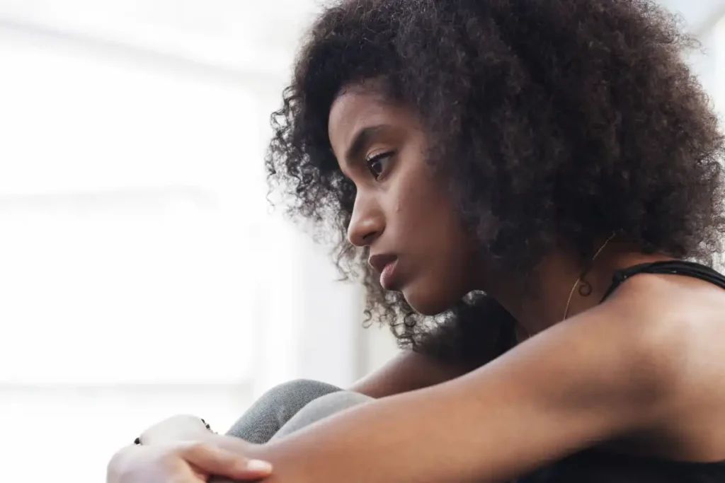 a young lady Challenges Negative Thinking to Stay Sober During Stressful Life Events