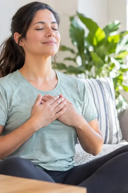 photo of a woman managing her stress without drugs and alcohol through meditation